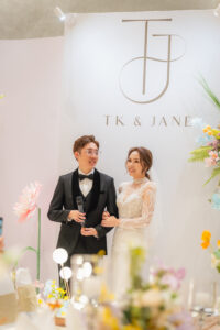 Bride and groom newlyweds giving speeches at wedding catering event by iDoCatering in Malaysia