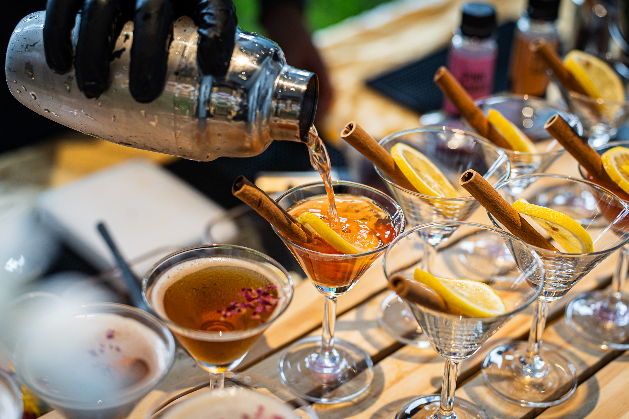 Beyond Coffee barista making non-coffee lemonade and peach beverages for wedding catering by iDoCatering