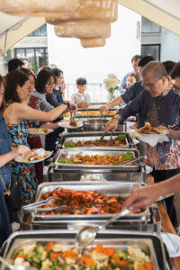 Guests enjoying wedding catering food by idocateringÂ